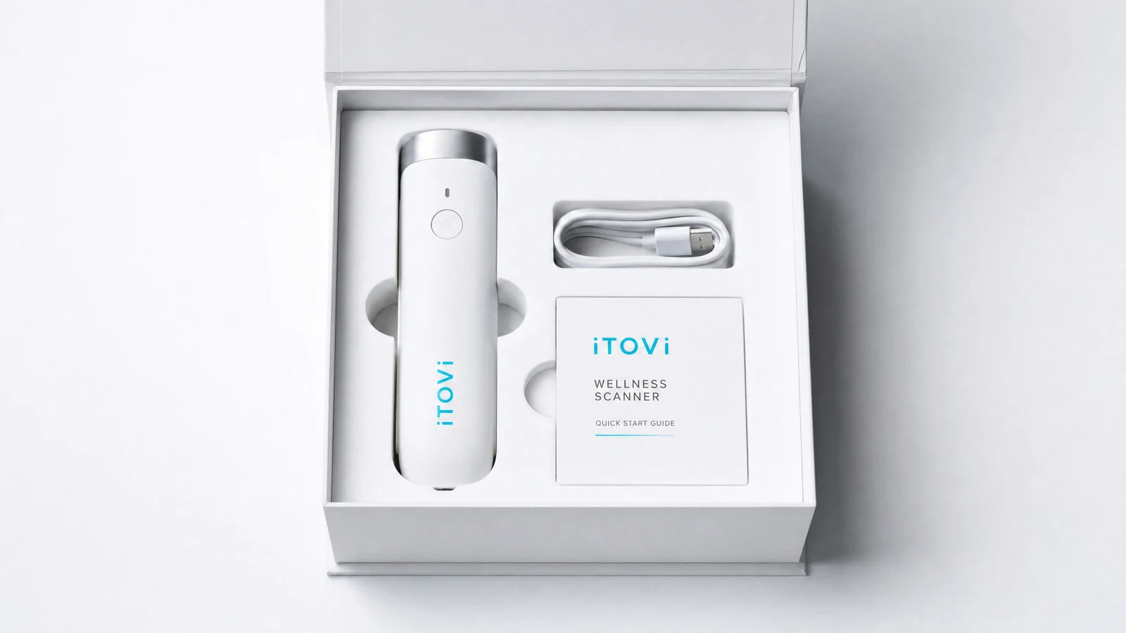 The iTOVi scanner, charging cable, and quick start guide in the box